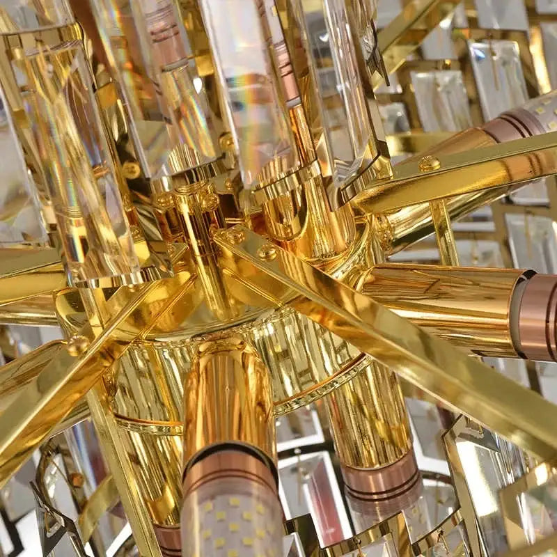 Golden decorbites crystal ceiling chandelier with crystal prisms and brass accents for modern home lighting