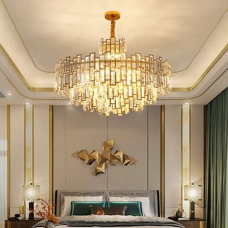 Decorbites crystal ceiling chandelier with cascading rectangular crystal prisms and gold-toned stainless steel fixture