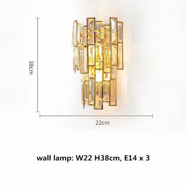 Gold-toned decorbites crystal ceiling wall lamp with modern stainless steel design and vertical rectangular crystal prisms illuminated by three e14 bulbs