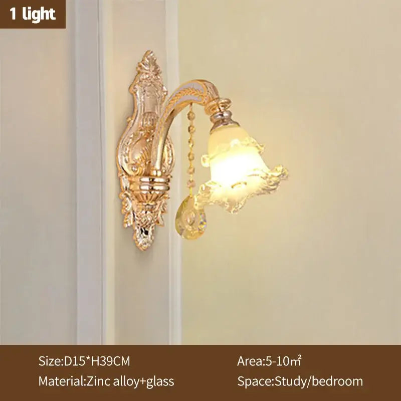 Gold-toned ornate wall sconce with glass bell-shaped shade and crystal droplet accent for decorbites crystal ceiling chandelier