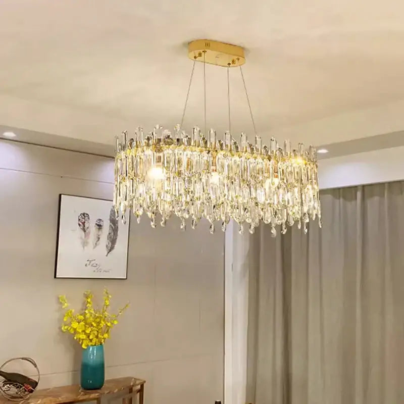 Decorbites crystal ceiling postmodern luxury oval chandelier with clear crystal prisms and gold-toned mount for indoor use