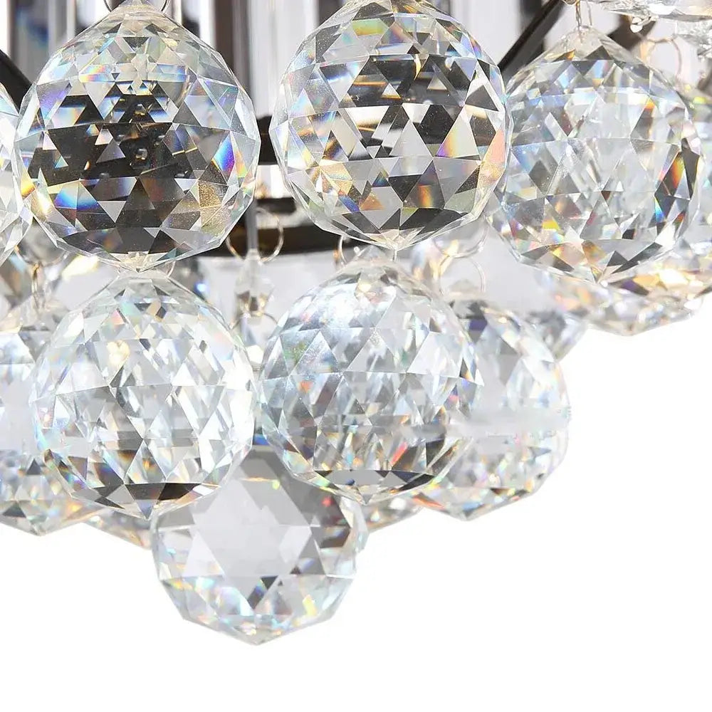 Clear faceted crystal spheres hang from decorbites crystal ceiling fan with light and remote control luxury design