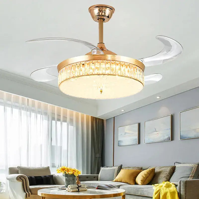 Gold-toned DecorBites crystal ceiling fan with LED light, remote control, crystal-encrusted fixture, and transparent blades