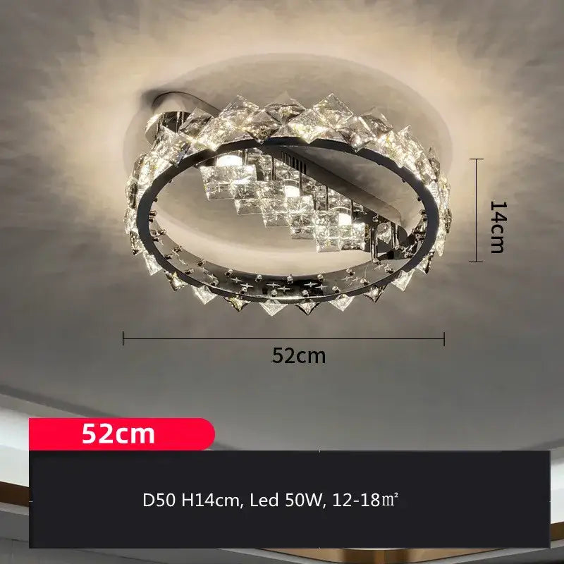 A modern oval-shaped decorbites crystal ceiling lamp with a sleek chrome frame and warm led dimmable glow