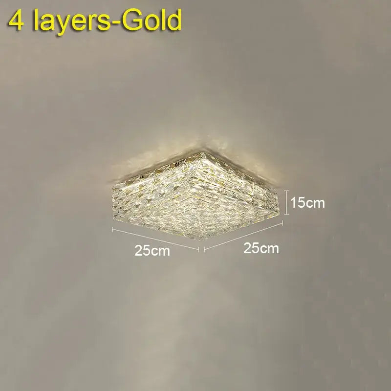 A square four-layered gold decorbites crystal ceiling lamp with textured faceted surface 25cm by 25cm for indoor use