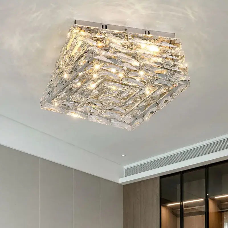 A modern decorbites crystal ceiling lamp with layered crystal design and warm LED lights for living room use