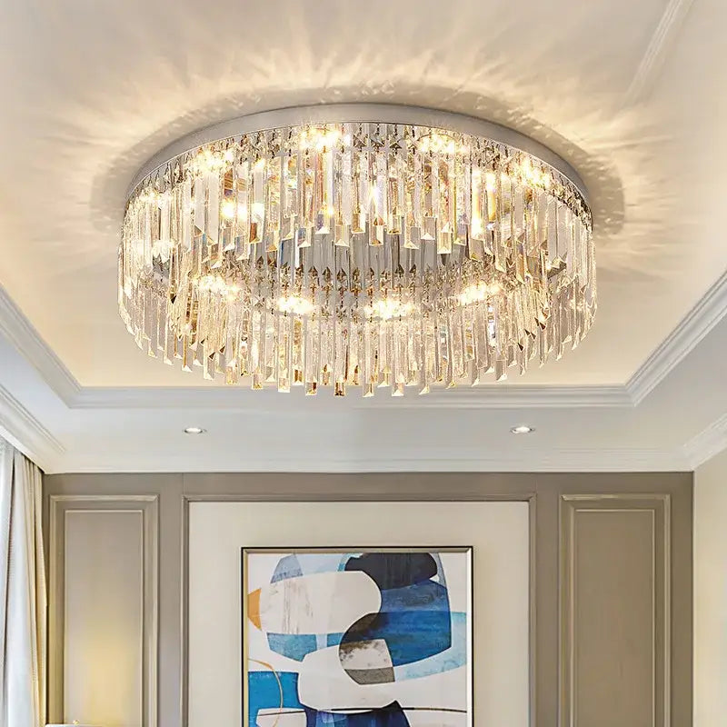 Decorbites crystal ceiling lamp with circular design and cascading clear and gold glass prisms on silver frame ceiling lamp