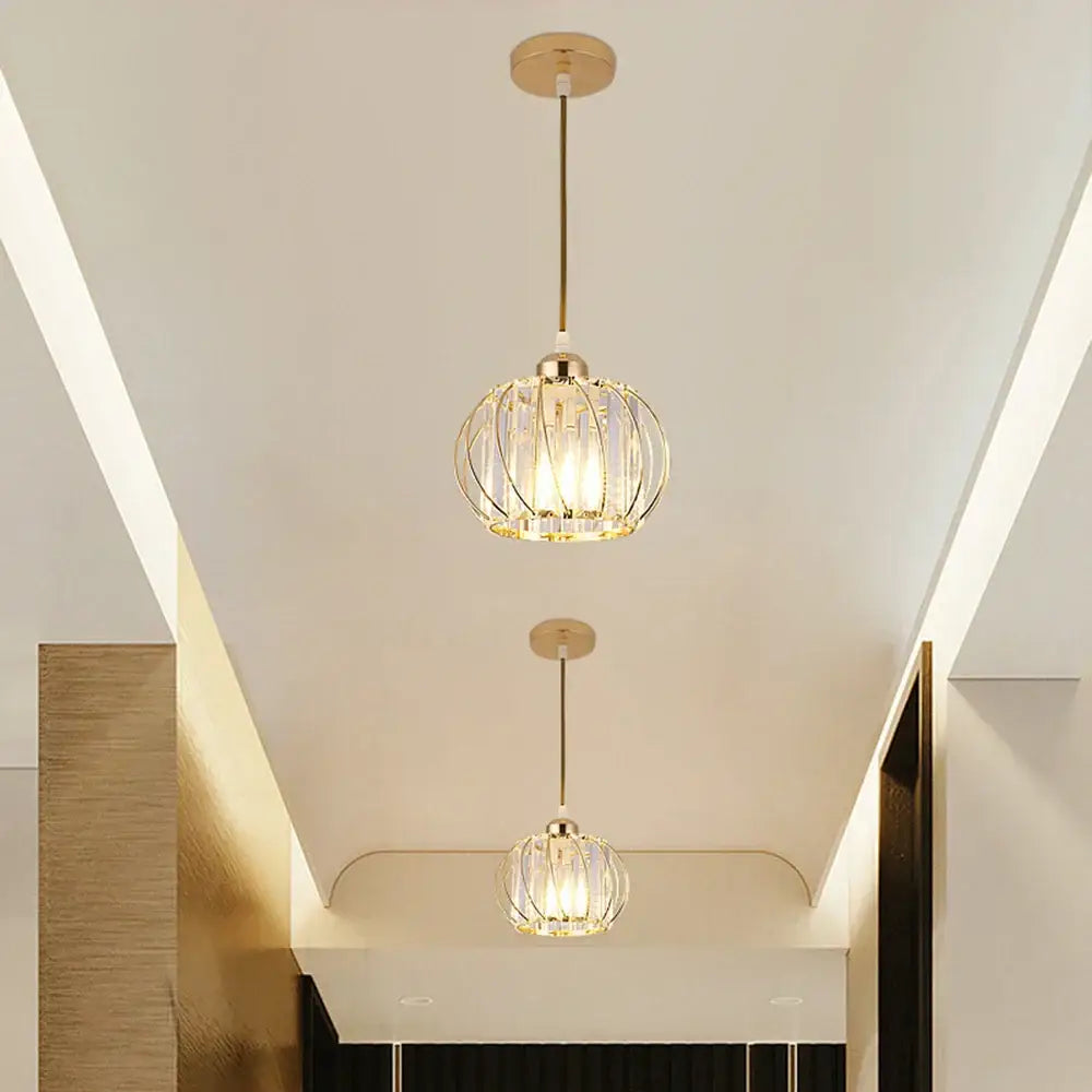 Gold-toned DecorBites crystal ceiling lamp with crystal cage design and warm glowing illumination for elegant home decor