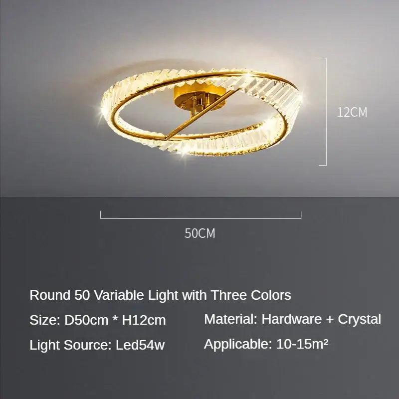 Gold-toned decorbites crystal ceiling lamp with two interlocking rings, clear crystals, and LED lighting for dining room