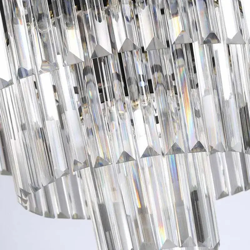 DecorBites crystal ceiling light featuring clear faceted prisms and metallic triangular accents for elegant décor