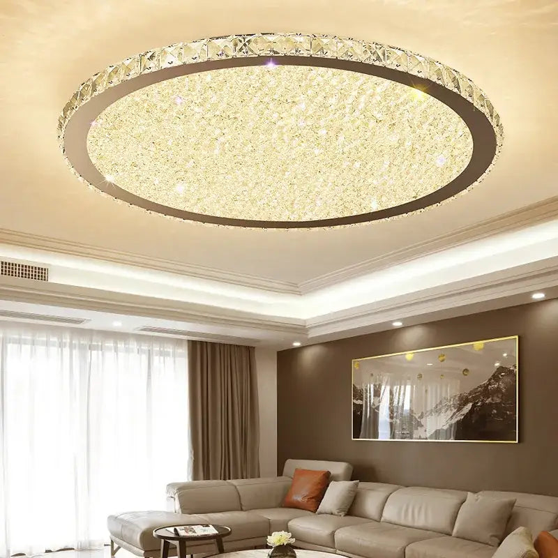 Decorbites crystal ceiling light with modern circular design, clear crystal accents, warm golden led illumination