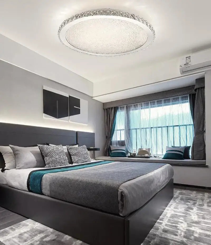 Decorbites crystal ceiling light with a sparkling crystal-encrusted ring and frosted glass center for living room use