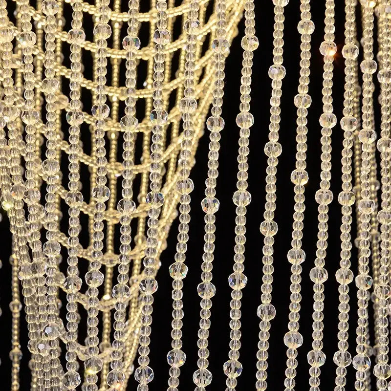 DecorBites™ crystal ceiling light featuring cascading clear crystal beads on gold-toned chains for elegant home lighting