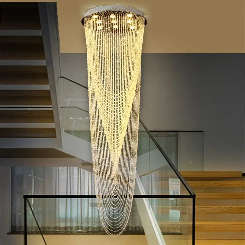 A luxurious DecorBites crystal ceiling light with cascading clear faceted beads and chrome finish for home lighting