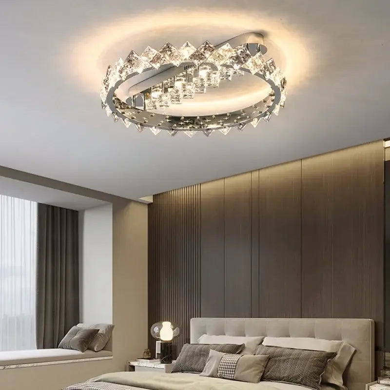 A modern decorbites crystal ceiling light with chrome frame and clear crystal accents for living room and bedroom