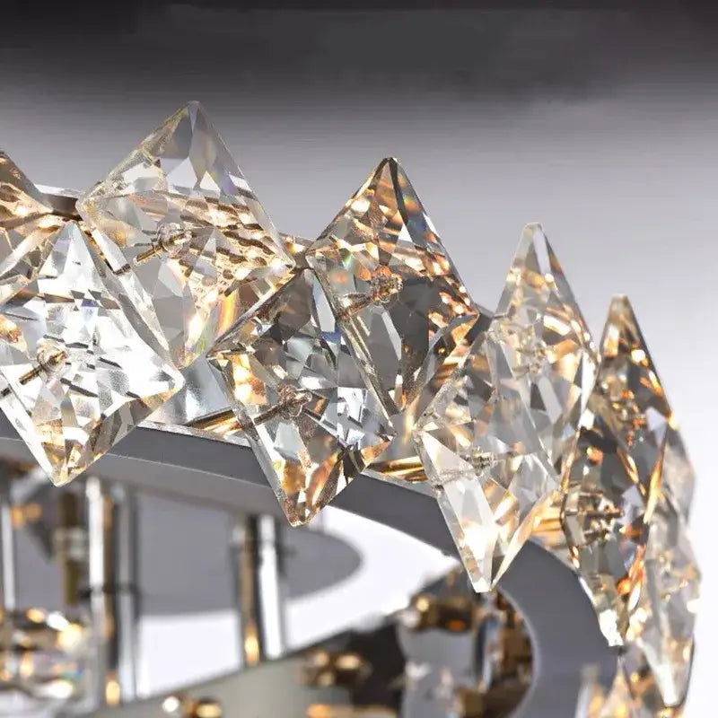 A decorbites crystal ceiling light with faceted clear crystal prisms in an elegant arc for modern living spaces