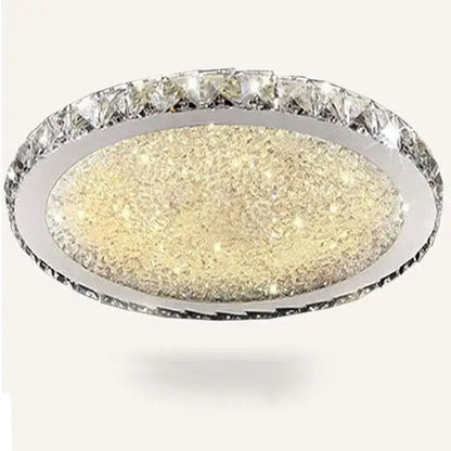 A decorbites crystal ceiling light with sparkling gold center and clear crystal ring in sleek chrome frame for living room