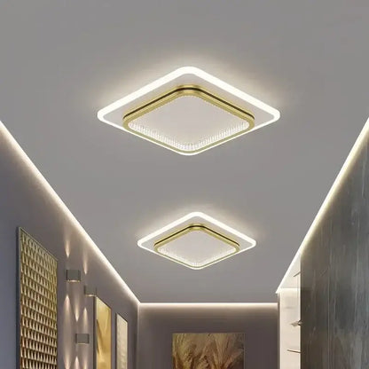 Modern square DecorBites™ crystal ceiling light with gold trim, LED edge, and clear crystal accents for home entrance
