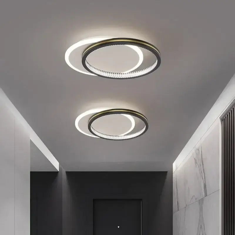 Decorbites™ crystal ceiling light with modern circular metallic frame and embedded led ring emitting soft white illumination