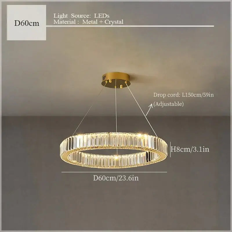 A modern gold-toned decorbites crystal ceiling pendant chandelier with clear crystal accents and led lighting for luxe decor