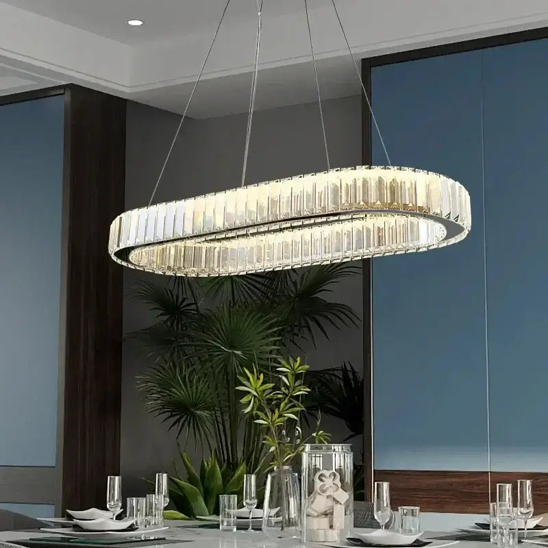 Decorbites crystal ceiling pendant chandelier with clear crystal facets and sleek metallic frame for luxury room decor