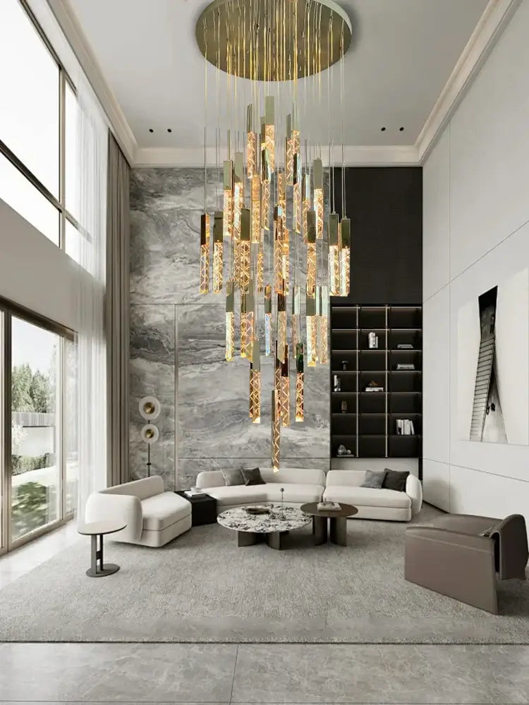 A modern decorbites crystal ceiling pendant light featuring cascading golden and translucent glass rods on brass ring