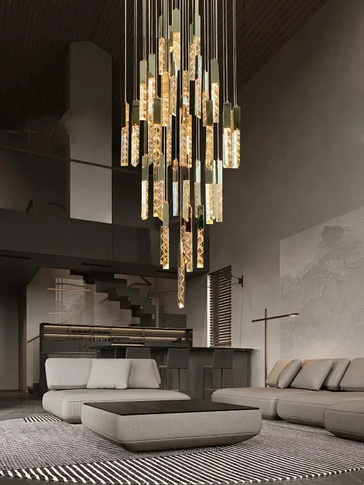 A modern decorbites crystal ceiling pendant light with cascading golden glass rods and metallic accents in circular design