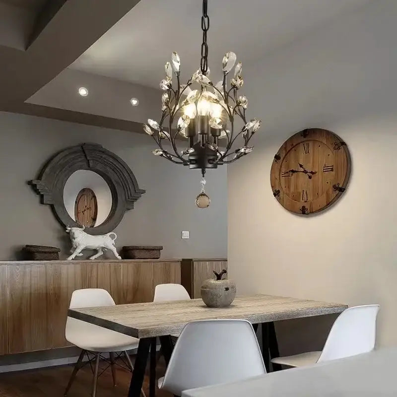 DecorBites crystal chain pendant chandelier with black wrought iron and crystal leaf accents for indoor decor