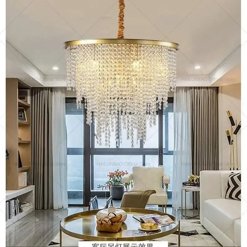 Gold-toned decorbites crystal chandelier with cascading crystal droplets for 2024 post-modern living room lighting