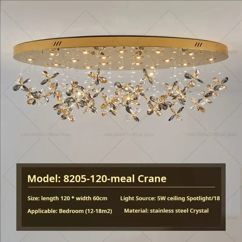 Gold-toned decorbites crystal chandelier with dangling crystal butterfly ornaments for luxury dining room lighting