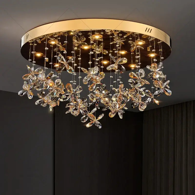 Gold-toned decorbites crystal chandelier with dangling crystal flower pendants for luxury dining rooms and kitchens