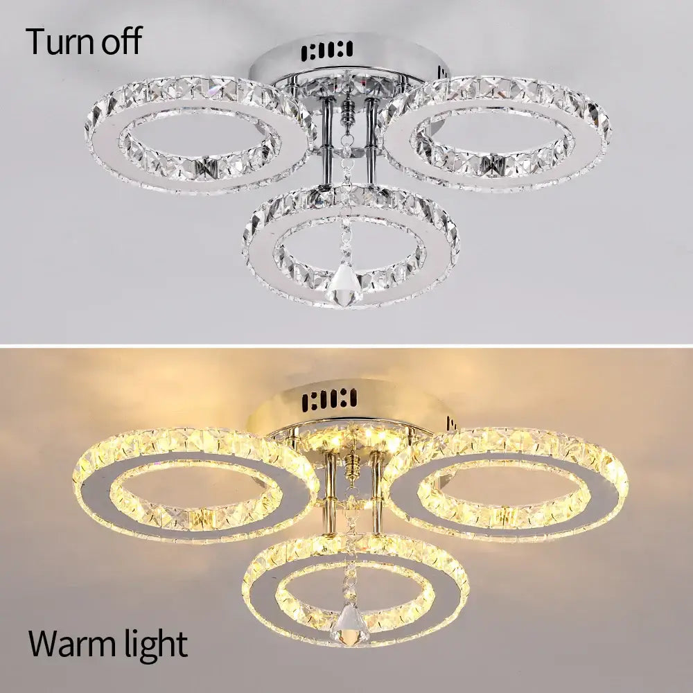 Chrome-finished decorbites crystal chandelier pendant light with three interlocking crystal rings and teardrop for bedroom