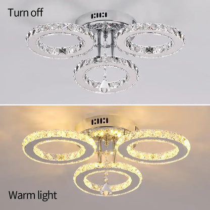 Chrome-finished decorbites crystal chandelier pendant light with three interlocking crystal rings and teardrop for bedroom