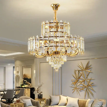 A luxurious gold-toned DecorBites crystal chandelier with clear crystal prisms for living room dining and bedroom