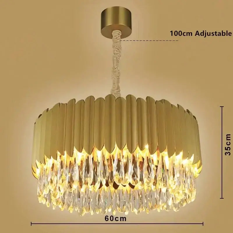 Gold-toned DecorBites crystal chandelier pendant light with circular fluted metallic frame and cascading crystal droplets