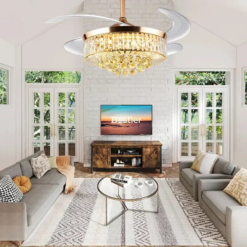 A modern decorbites crystal chandelier ceiling fan with rose gold finish and cascading golden crystal accents