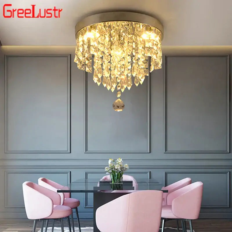 Gold-toned crystal chandelier ceiling lamp with circular frame and cascading faceted crystals for home decor