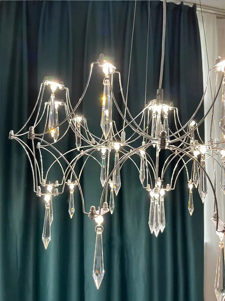 Elegant decorbites crystal chandelier pendant light with sleek chrome frame and faceted glass prisms for home lighting