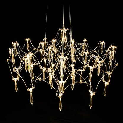 A modern decorbites crystal chandelier pendant light with metallic frame and crystal pendants for home lighting