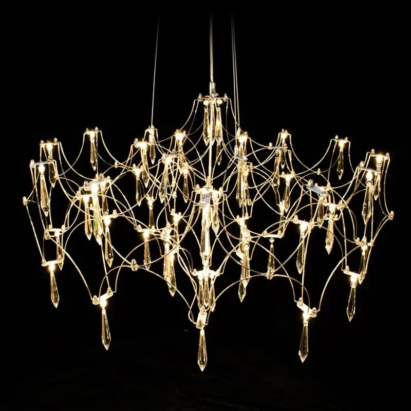 A modern decorbites crystal chandelier pendant light with metallic frame and crystal pendants for home lighting