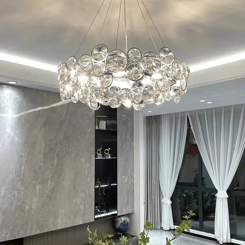 DecorBites™ chrome pendant light fixture with circular design featuring clear faceted glass discs for modern luxury decor