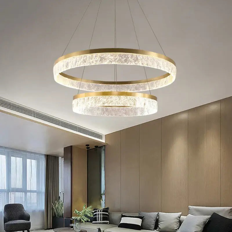 Modern decorbites crystal chandelier circular pendant light with gold metallic frames and crackled glass panels emitting warm glow