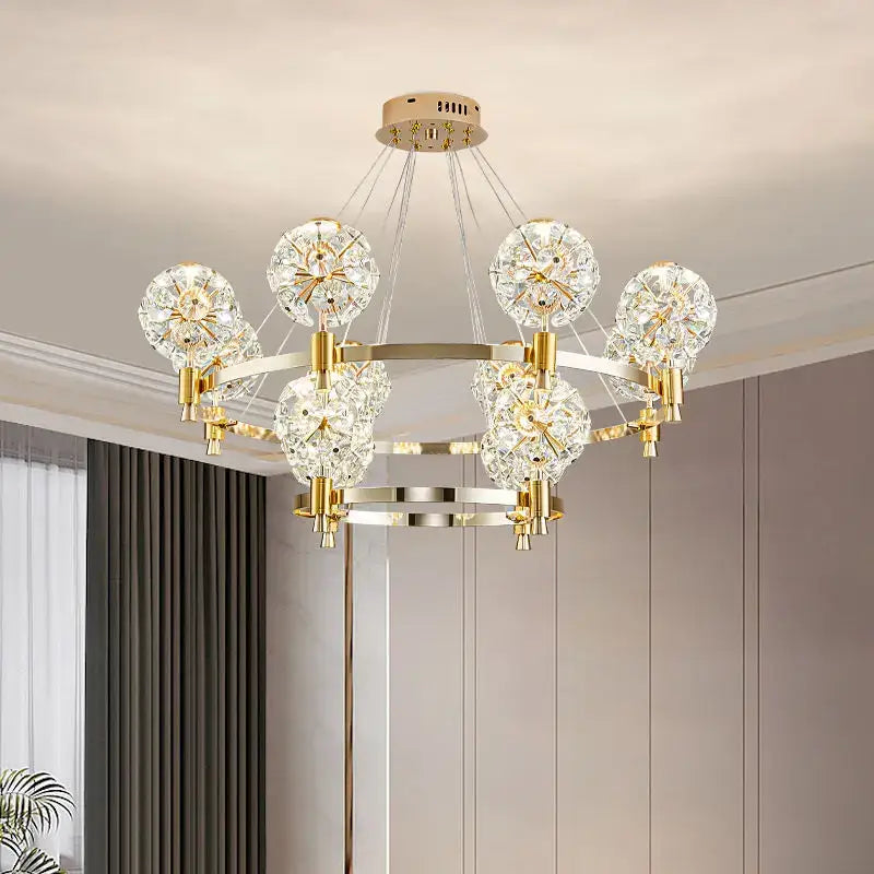 Gold-toned decorbites crystal chandelier with multiple crystal globe lights in dandelion design for luxe living spaces