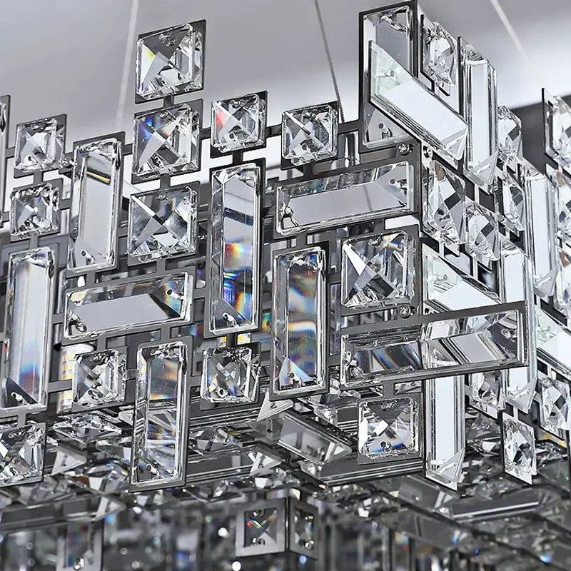 Modern geometric decorbites crystal chandelier with clear faceted crystal prisms in sleek chrome for living room use