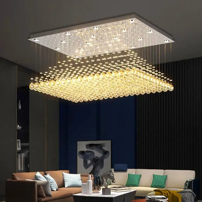 Square decorbites crystal chandelier with modern design featuring cascading golden beads and embedded led lights for dining room illumination