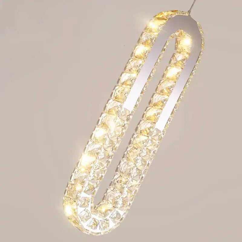 A modern u-shaped pendant light with clear crystal facets and warm led lighting by decorbites crystal chandelier dining room pendant lights