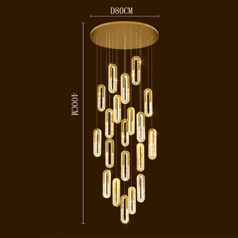 Gold-toned DecorBites crystal chandelier with circular mount and cascading oval pendant lights for crystal chandelier dining