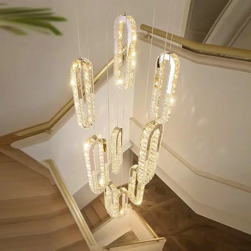 DecorBites crystal chandelier pendant lights with cascading crystal oval rings and warm led lighting for dining rooms