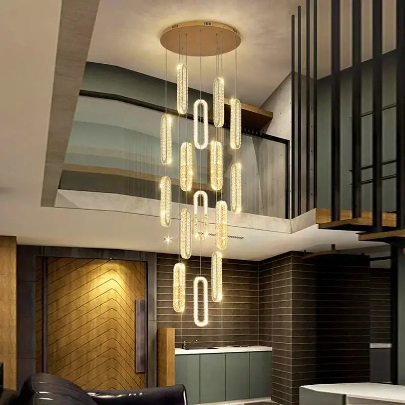 Modern gold-toned decorbites crystal chandelier pendant lights with cascading oval fixtures for crystal chandelier dining