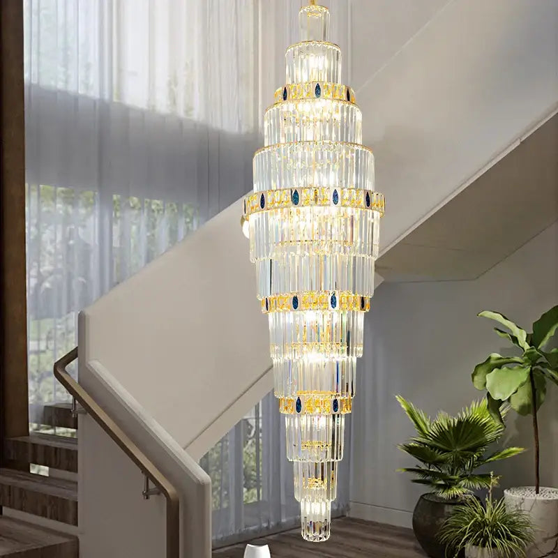Decorbites crystal chandelier multi-tiered with gold accents and blue gemstones luxury contemporary light fixture